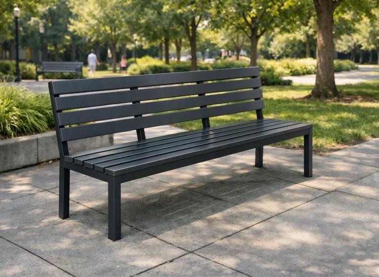Steel picnic table with four attached bench seats in a park plaza